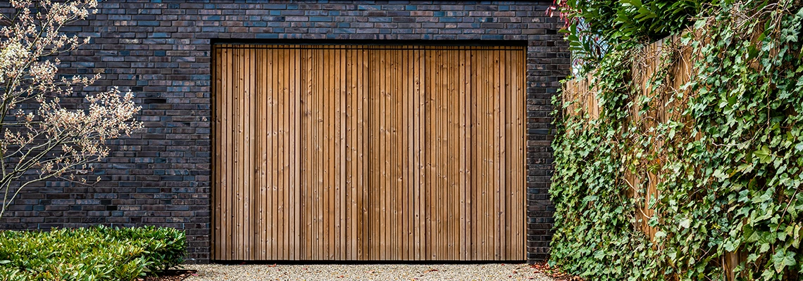 Amarr Traditional Garage Doors Tracks Repair in Kendale Lakes, Florida